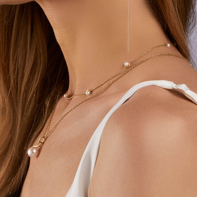 Multi-motif pearl necklace
