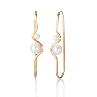 Elongated hoop double pearl earrings