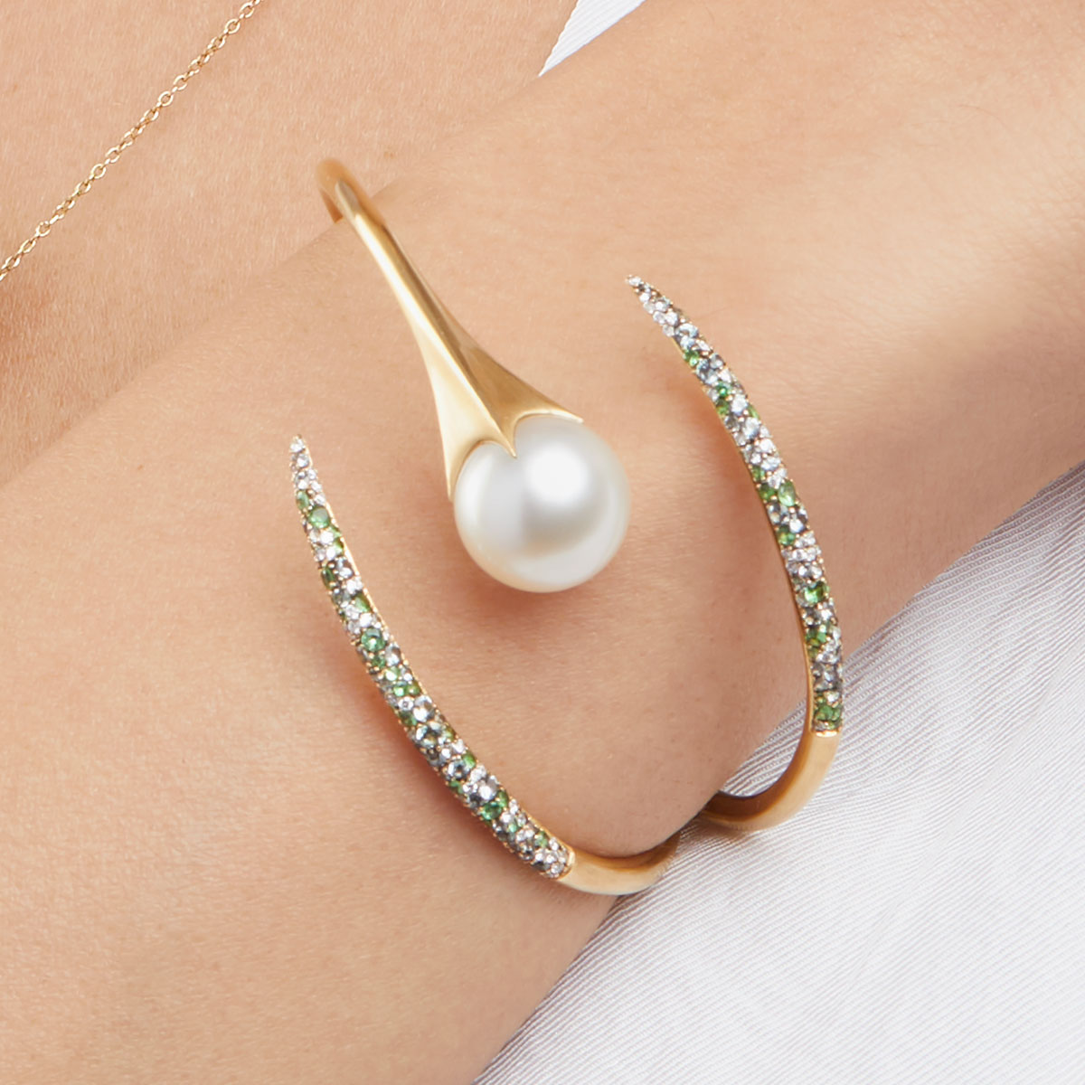 Hinged serpent cuff with white South Sea Pearl and pavé